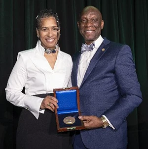 Oscar Barton, Jr., Ph.D. presents the 2024 Hoover Medal to Aprille J. Ericsson, Ph.D.